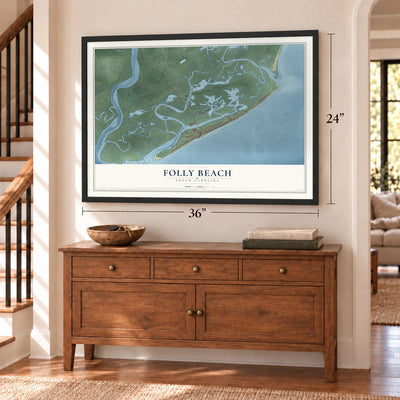 Folly Beach, South Carolina map, 24 x 36 inch print in a black frame above a dresser by a staircase