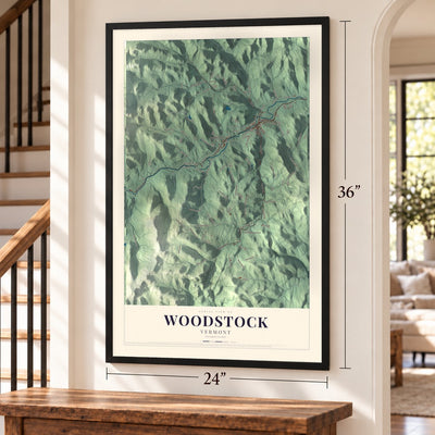 Woodstock, Vermont map, 24 x 36 inch print in a black frame by a staircase
