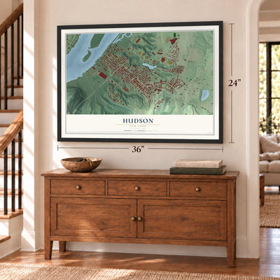 Hudson, New York map, 24 x 36 inch print in a black frame above a dresser by a staircase
