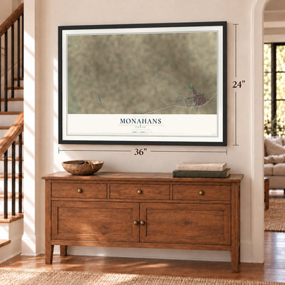 Monahans, Texas map, 24 x 36 inch print in a black frame above a dresser by a staircase
