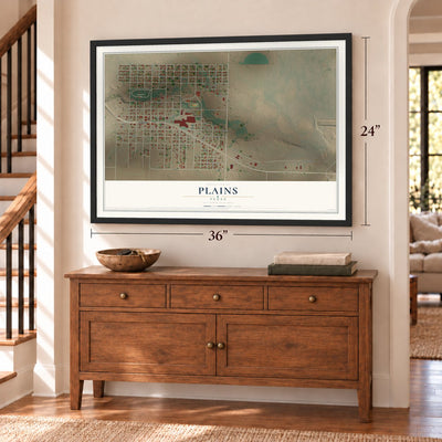 Plains, Texas map, 24 x 36 inch print in a black frame above a dresser by a staircase