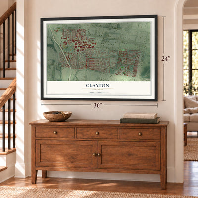 Clayton, Missouri map, 24 x 36 inch print in a black frame above a dresser by a staircase
