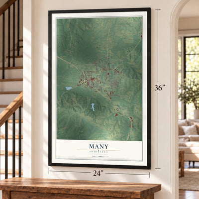 Many, Louisiana map, 24 x 36 inch print in a black frame by a staircase