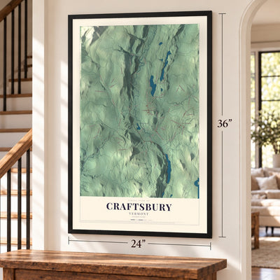 Craftsbury, Vermont map, 24 x 36 inch print in a black frame by a staircase