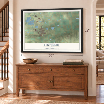 Berthoud, Colorado map, 24 x 36 inch print in a black frame above a dresser by a staircase