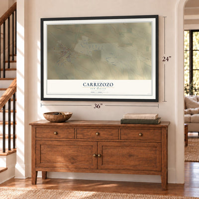 Carrizozo, New Mexico map, 24 x 36 inch print in a black frame above a dresser by a staircase