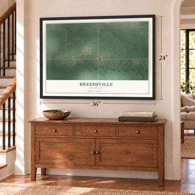 Breedsville, Michigan map, 24 x 36 inch print in a black frame above a dresser by a staircase
