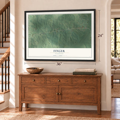 Finger, Tennessee map, 24 x 36 inch print in a black frame above a dresser by a staircase