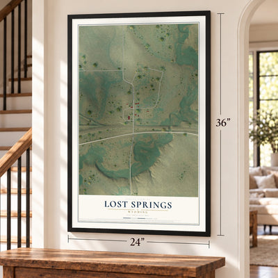 Lost Springs, Wyoming map, 24 x 36 inch print in a black frame by a staircase