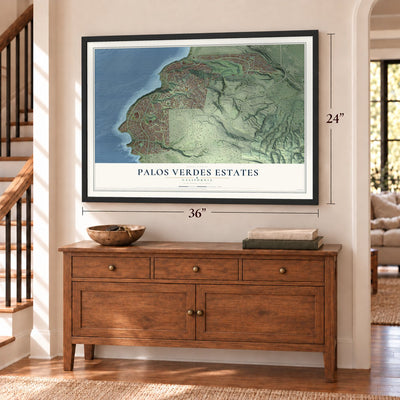 Palos Verdes Estates, California map, 24 x 36 inch print in a black frame above a dresser by a staircase