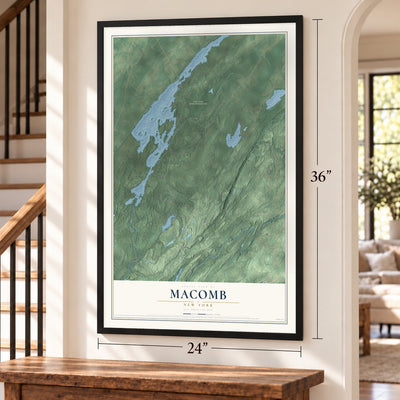 Macomb, New York map, 24 x 36 inch print in a black frame by a staircase