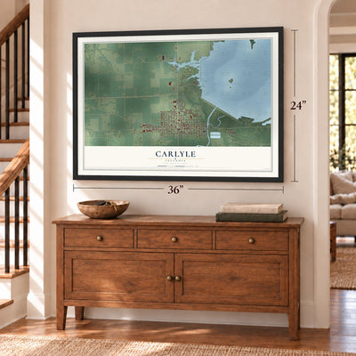 Carlyle, Illinois map, 24 x 36 inch print in a black frame above a dresser by a staircase