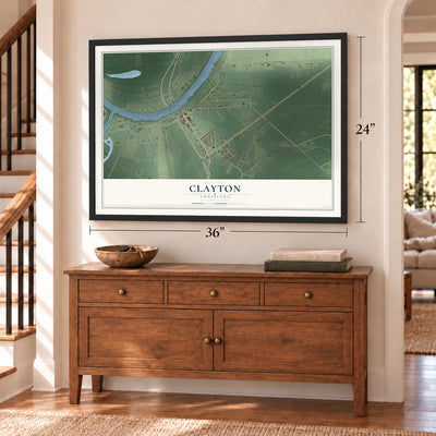 Clayton, Louisiana map, 24 x 36 inch print in a black frame above a dresser by a staircase