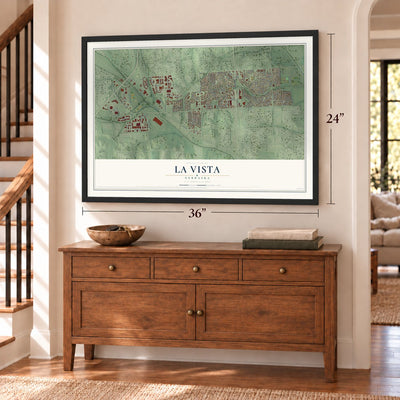 La Vista, Nebraska map, 24 x 36 inch print in a black frame above a dresser by a staircase