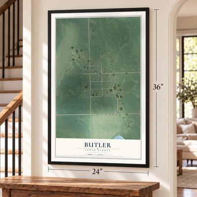 Butler, South Dakota map, 24 x 36 inch print in a black frame by a staircase