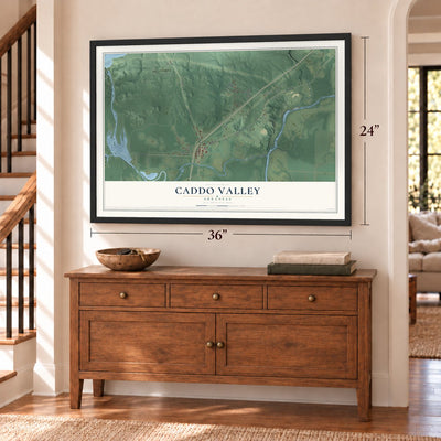 Caddo Valley, Arkansas map, 24 x 36 inch print in a black frame above a dresser by a staircase