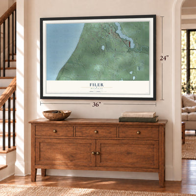 Filer, Michigan map, 24 x 36 inch print in a black frame above a dresser by a staircase