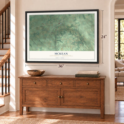 McKean, Erie County, Pennsylvania map, 24 x 36 inch print in a black frame above a dresser by a staircase