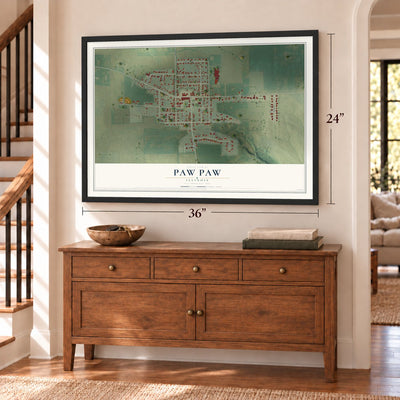 Paw Paw, Illinois map, 24 x 36 inch print in a black frame above a dresser by a staircase