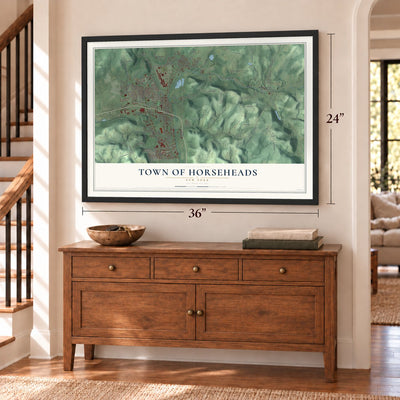 Town of Horseheads, New York map, 24 x 36 inch print in a black frame above a dresser by a staircase