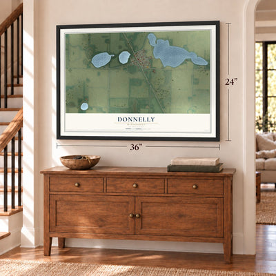 Donnelly, Minnesota map, 24 x 36 inch print in a black frame above a dresser by a staircase