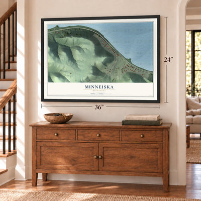 Minneiska, Minnesota map, 24 x 36 inch print in a black frame above a dresser by a staircase