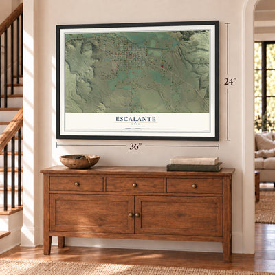 Escalante, Utah map, 24 x 36 inch print in a black frame above a dresser by a staircase