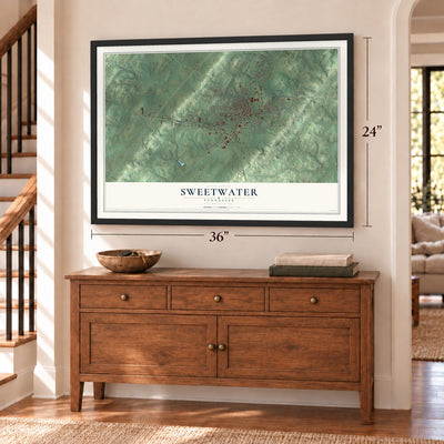 Sweetwater, Tennessee map, 24 x 36 inch print in a black frame above a dresser by a staircase