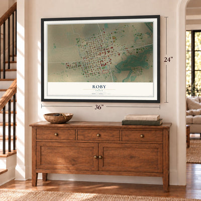 Roby, Texas map, 24 x 36 inch print in a black frame above a dresser by a staircase