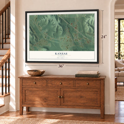 Kansas, Alabama map, 24 x 36 inch print in a black frame above a dresser by a staircase
