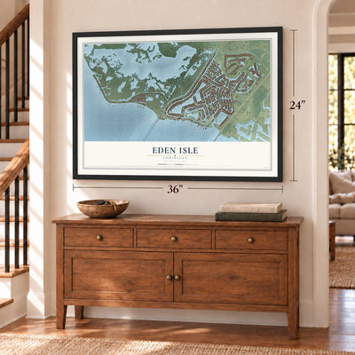 Eden Isle, Louisiana map, 24 x 36 inch print in a black frame above a dresser by a staircase