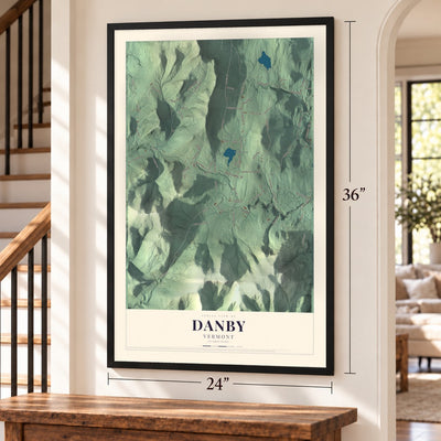 Danby, Vermont map, 24 x 36 inch print in a black frame by a staircase