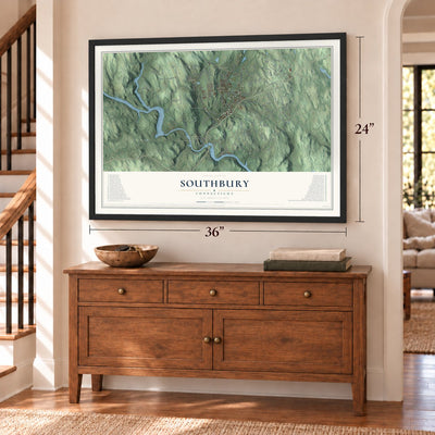 Southbury, Connecticut map, 24 x 36 inch print in a black frame above a dresser by a staircase