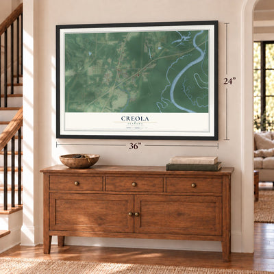 Creola, Alabama map, 24 x 36 inch print in a black frame above a dresser by a staircase