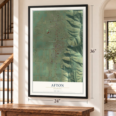 Afton, Wyoming map, 24 x 36 inch print in a black frame by a staircase