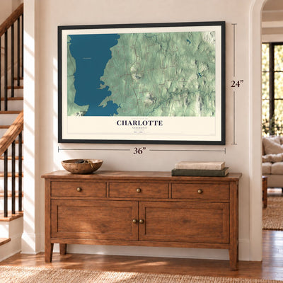 Charlotte, Vermont map, 24 x 36 inch print in a black frame above a dresser by a staircase