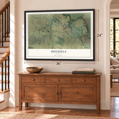Brussels, Illinois map, 24 x 36 inch print in a black frame above a dresser by a staircase