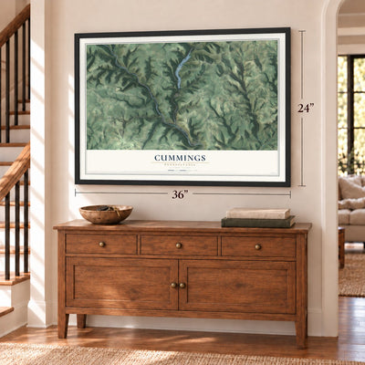 Cummings, Pennsylvania map, 24 x 36 inch print in a black frame above a dresser by a staircase