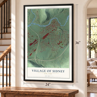 Village of Sidney, New York map, 24 x 36 inch print in a black frame by a staircase