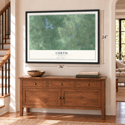 Curtis, Michigan map, 24 x 36 inch print in a black frame above a dresser by a staircase