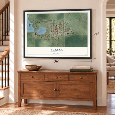 Eureka, South Dakota map, 24 x 36 inch print in a black frame above a dresser by a staircase