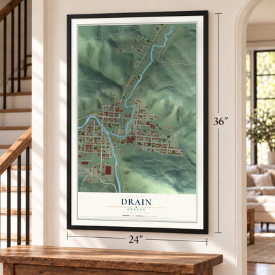Drain, Oregon map, 24 x 36 inch print in a black frame by a staircase