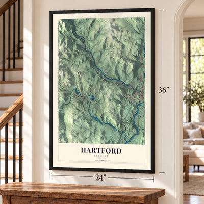 Hartford, Vermont map, 24 x 36 inch print in a black frame by a staircase