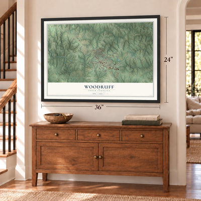 Woodruff, South Carolina map, 24 x 36 inch print in a black frame above a dresser by a staircase