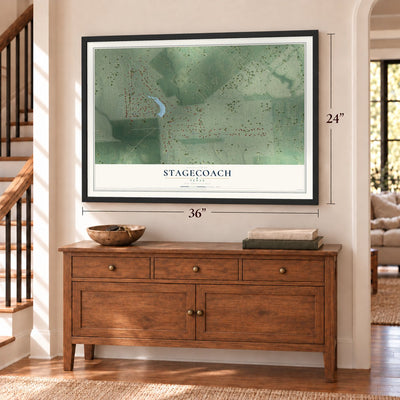 Stagecoach, Texas map, 24 x 36 inch print in a black frame above a dresser by a staircase