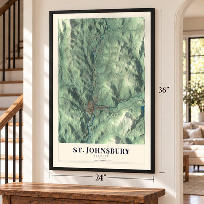 St. Johnsbury, Vermont map, 24 x 36 inch print in a black frame by a staircase