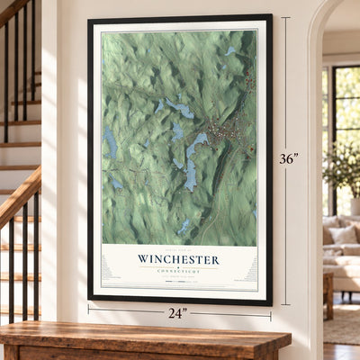 Winchester, Connecticut map, 24 x 36 inch print in a black frame by a staircase