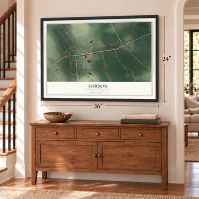 Gibson, North Carolina map, 24 x 36 inch print in a black frame above a dresser by a staircase