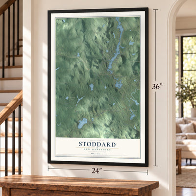 Stoddard, New Hampshire map, 24 x 36 inch print in a black frame by a staircase