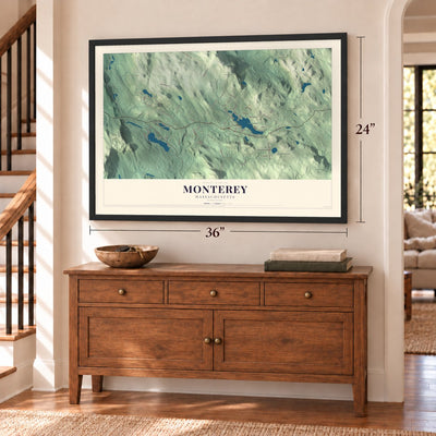Monterey, Massachusetts map, 24 x 36 inch print in a black frame above a dresser by a staircase